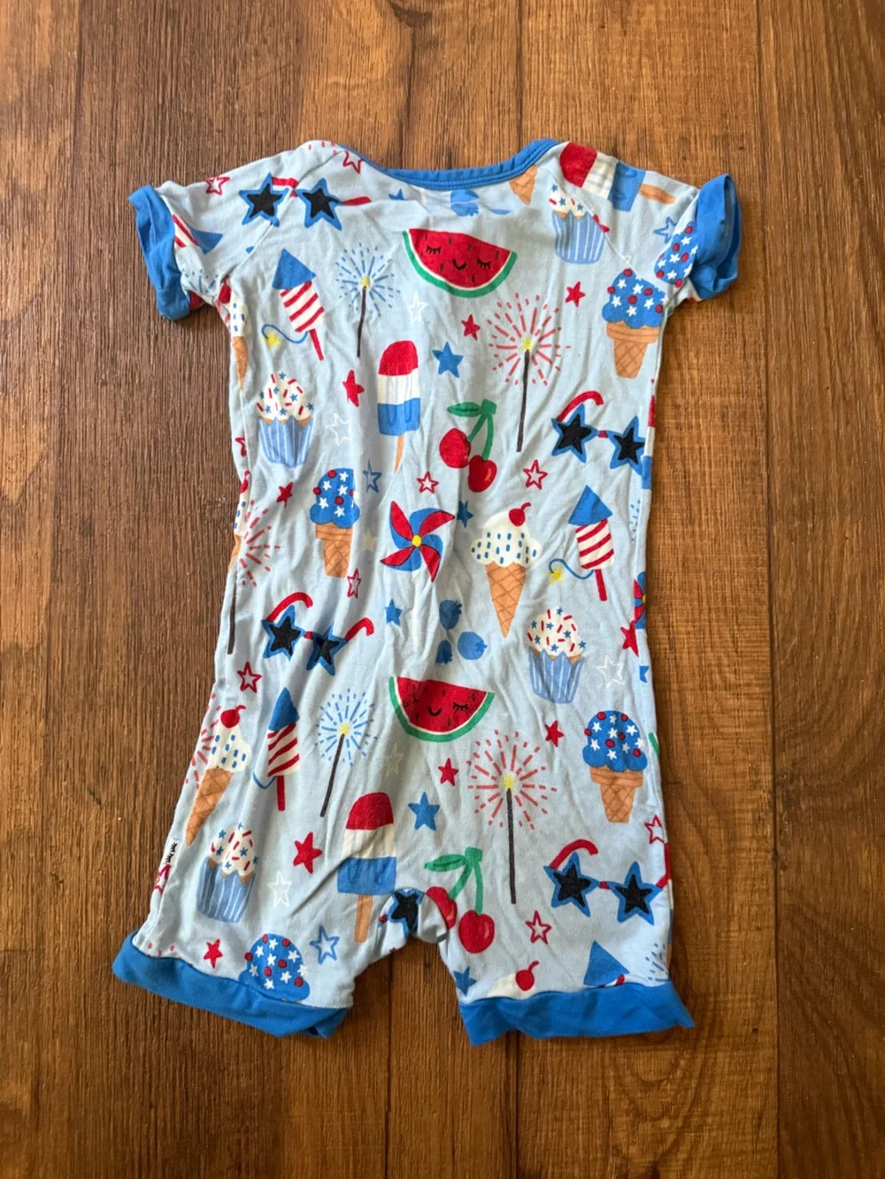 Little Sleepies White One-Piece Romper with Red, Blue, Green Accents